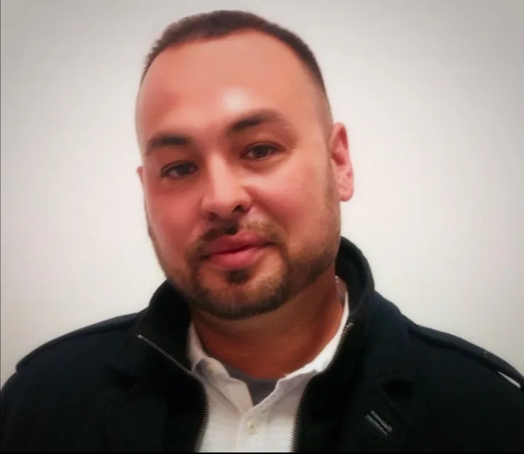 Portrait of Dr. Itoco Garcia, CH³ Educational Health Advisor