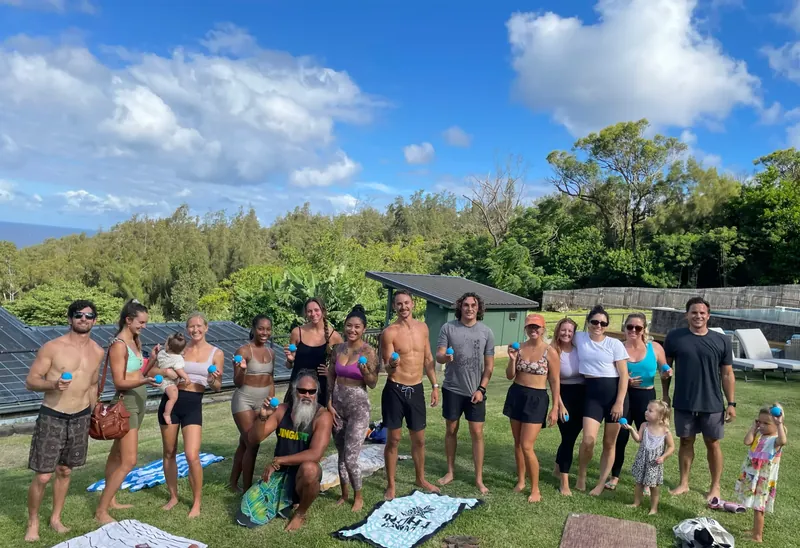 Participants and families gathered after a CH³ Tension Release session in Pūpūkea.
